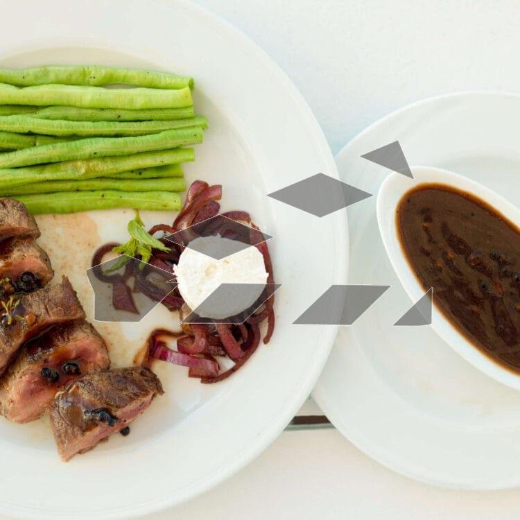 A plate featuring a fresh slice of beef