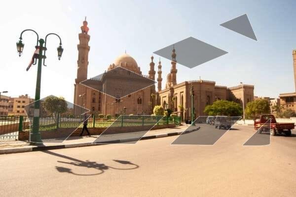 A stunning view of Sultan Hassan Mosque alongside Al-Rifai Mosque in Cairo, Egypt