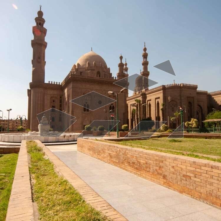 A stunning view of Sultan Hassan Mosque alongside Al-Rifai Mosque in Cairo, Egypt