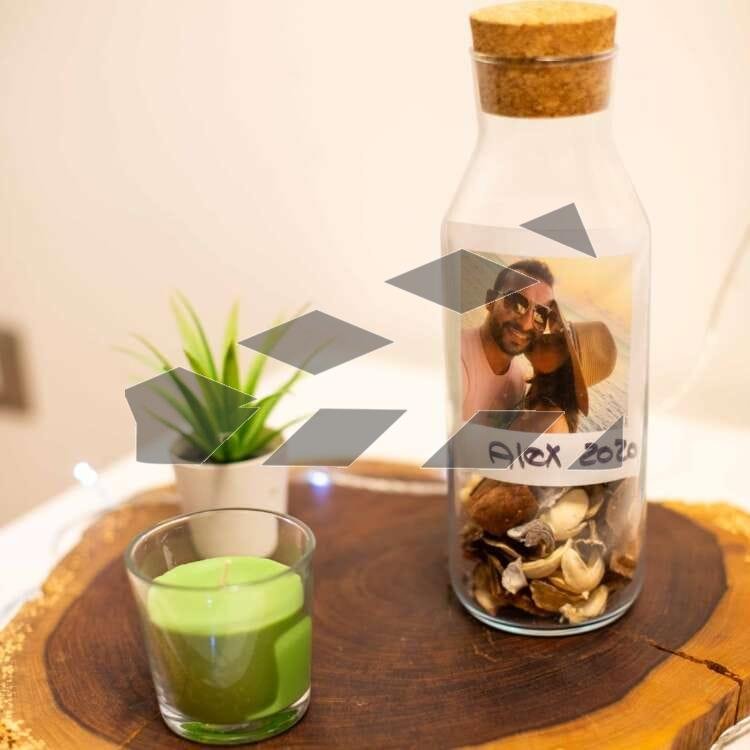 A handmade bottle with a family photo inside