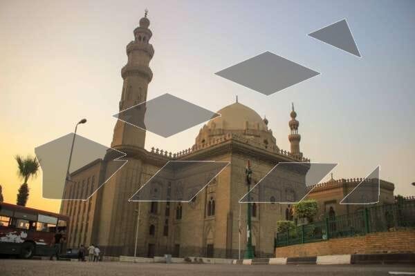 A stunning view of Sultan Hassan Mosque alongside Al-Rifai Mosque in Cairo, Egypt