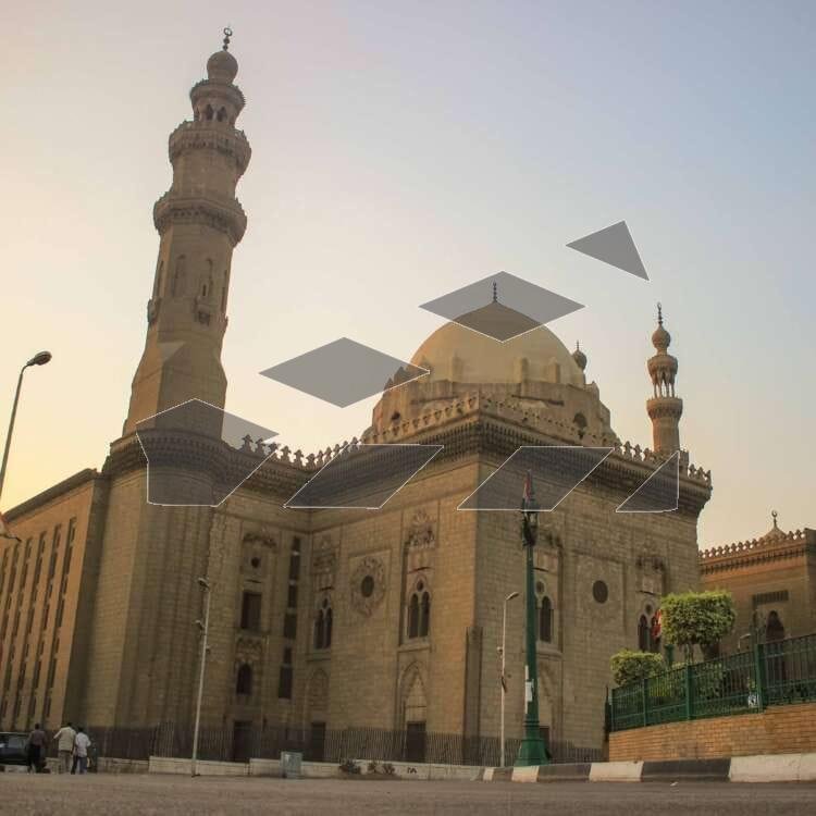 A stunning view of Sultan Hassan Mosque alongside Al-Rifai Mosque in Cairo, Egypt