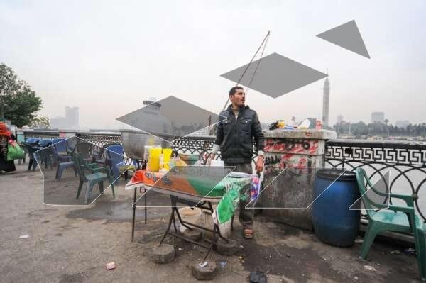 A street vendor prepares and serves Hummus El-Sham Egypt, Cairo.