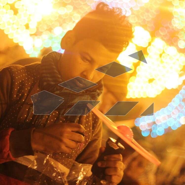 Portrait of a Child Playing at a Traditional Egyptian Mawlid – Cairo, Egypt