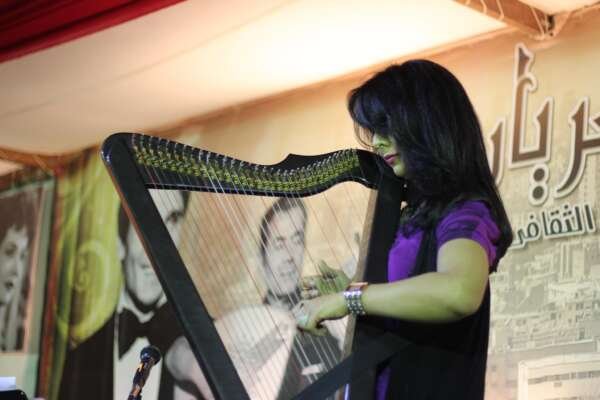 Portrait of a Girl Playing the Harp – Music and Grace in Harmony