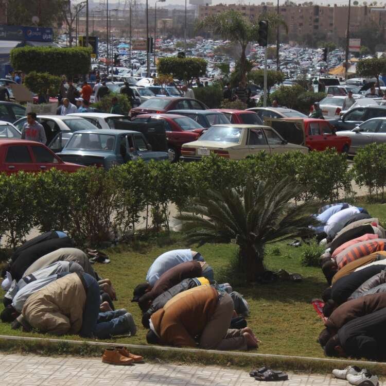 Friday Prayer at the Car Market in Nasr City – A Spiritual Scene Amidst Urban Hustle