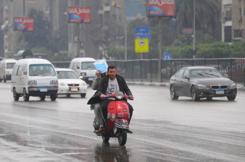 Red Scooter Commute in Cairo