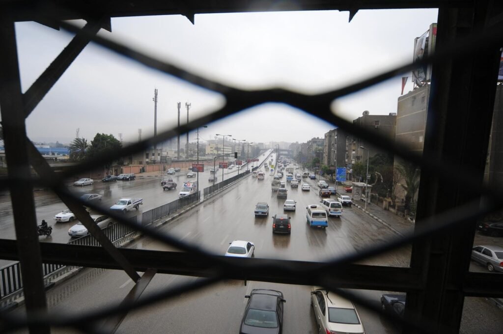 
									Cairo City Traffic on a Rainy Day