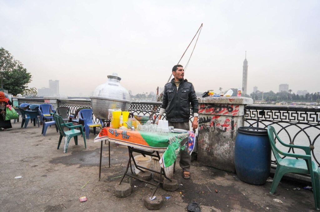 A street vendor prepares and serves Hummus El-Sham Egypt, Cairo.