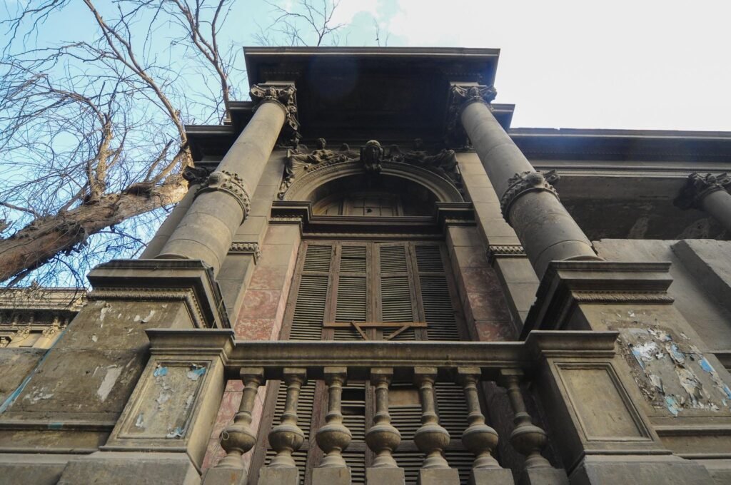 A view of Champollion Street in Cairo, with its historic buildings and bustling atmosphere, captured in 2015 2