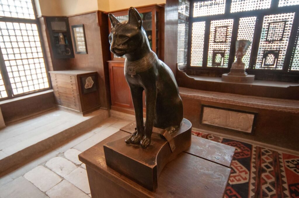 Statue of an ancient Egyptian cat displayed inside the Gayer-Anderson Museum in Old Cairo, Egypt.