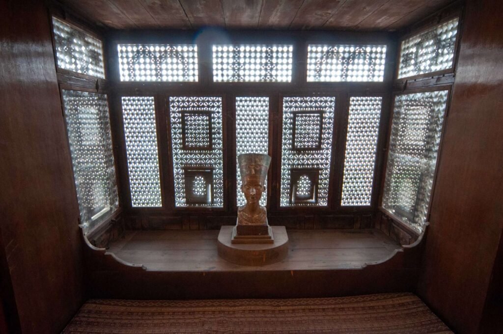 Close-up of an ancient Egyptian pharaoh’s head sculpture displayed at the Gayer-Anderson Museum in Old Cairo, Egypt.