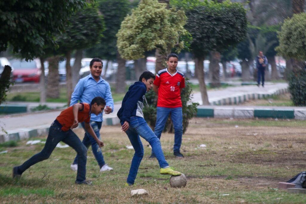 Boys Playing Soccer in a Park, Cairo Winter 2017 4