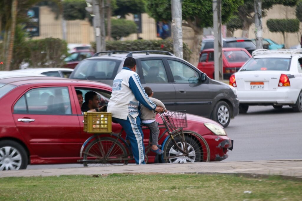 Man riding a bicycle in Cairo, Winter 2017 2