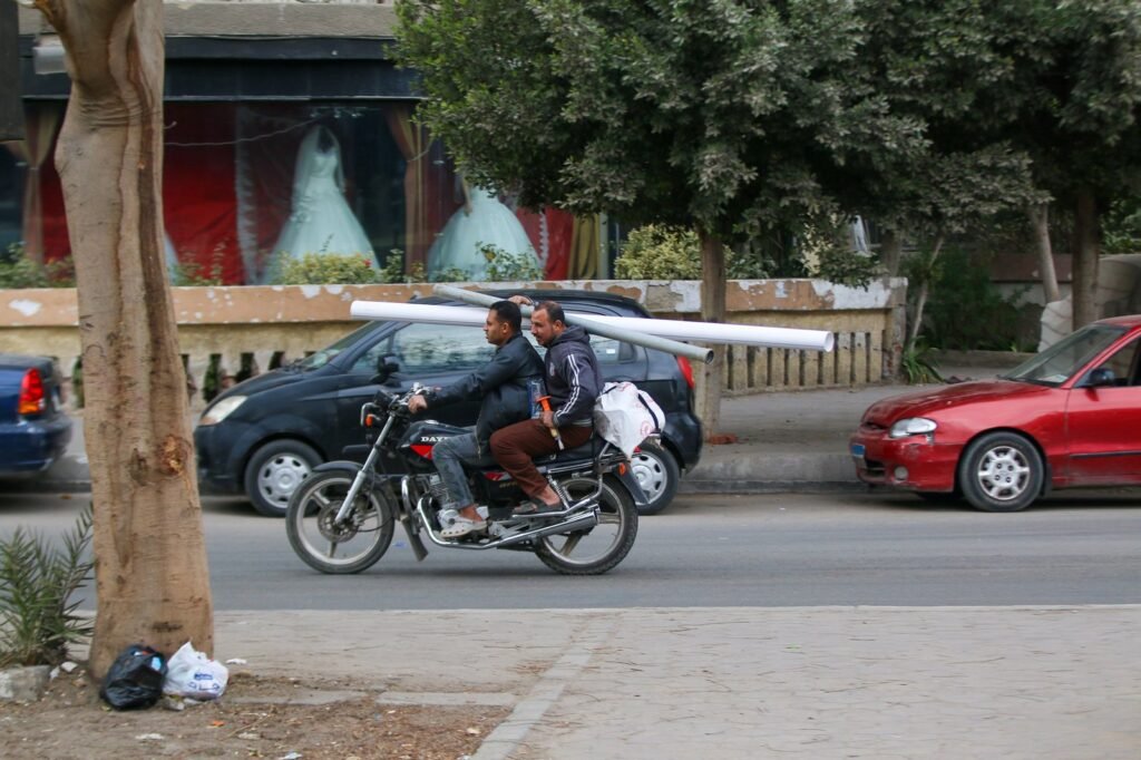 Motorcycle Carrying Long Pipes, Cairo Winter 2017