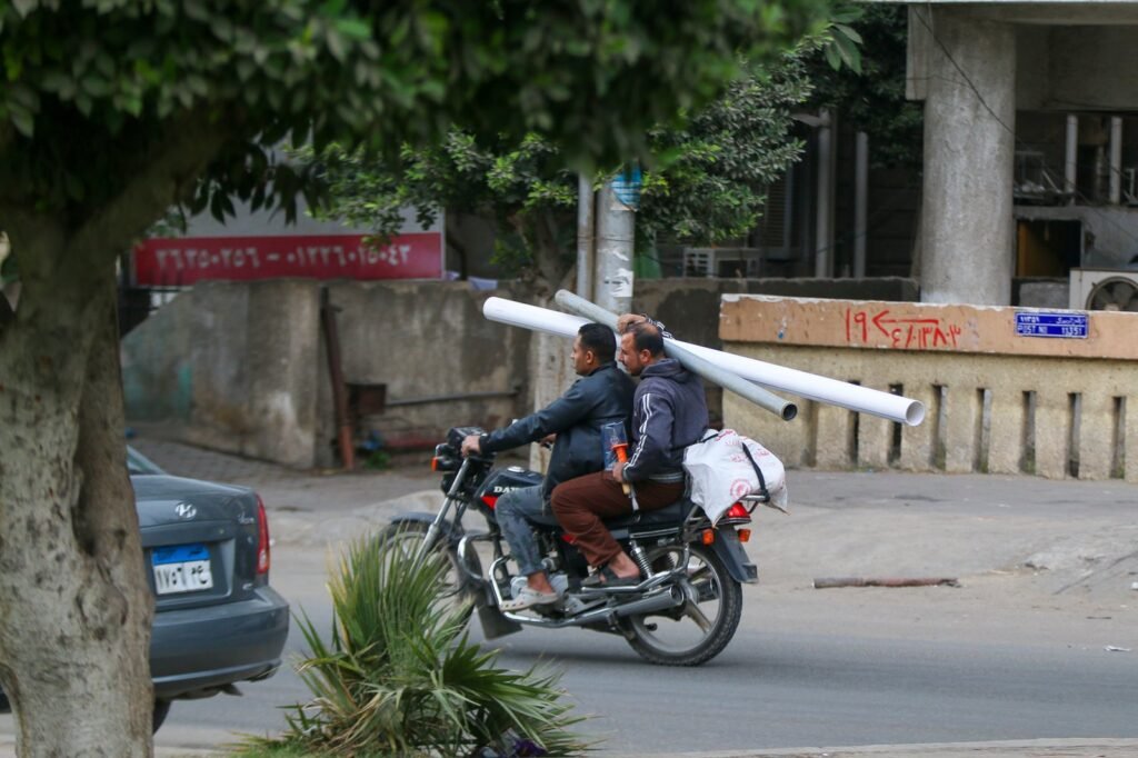Motorcycle Carrying Long Pipes, Cairo Winter 2017 – 2