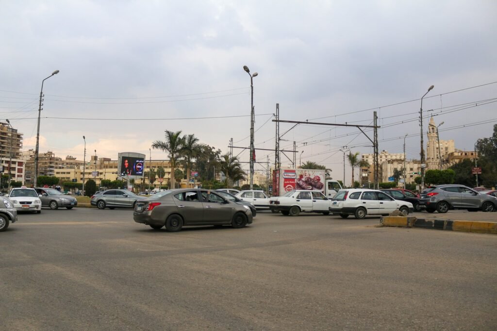 Traffic at a Busy Intersection, Cairo under Cloudy Sky