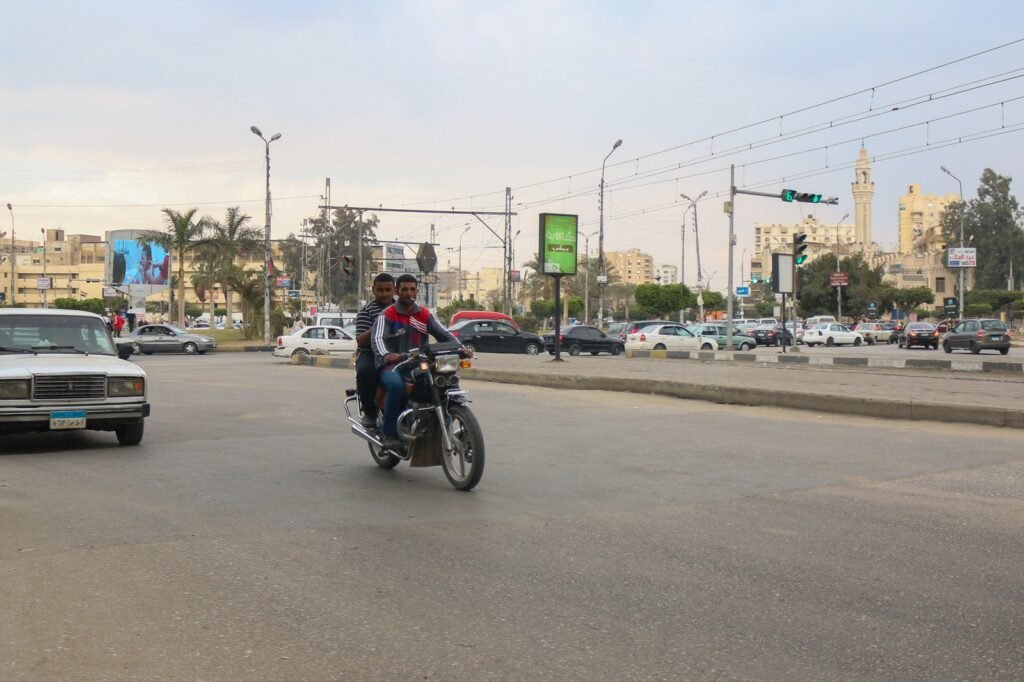 Two Men Riding a Motorcycle – Heliopolis, Cairo