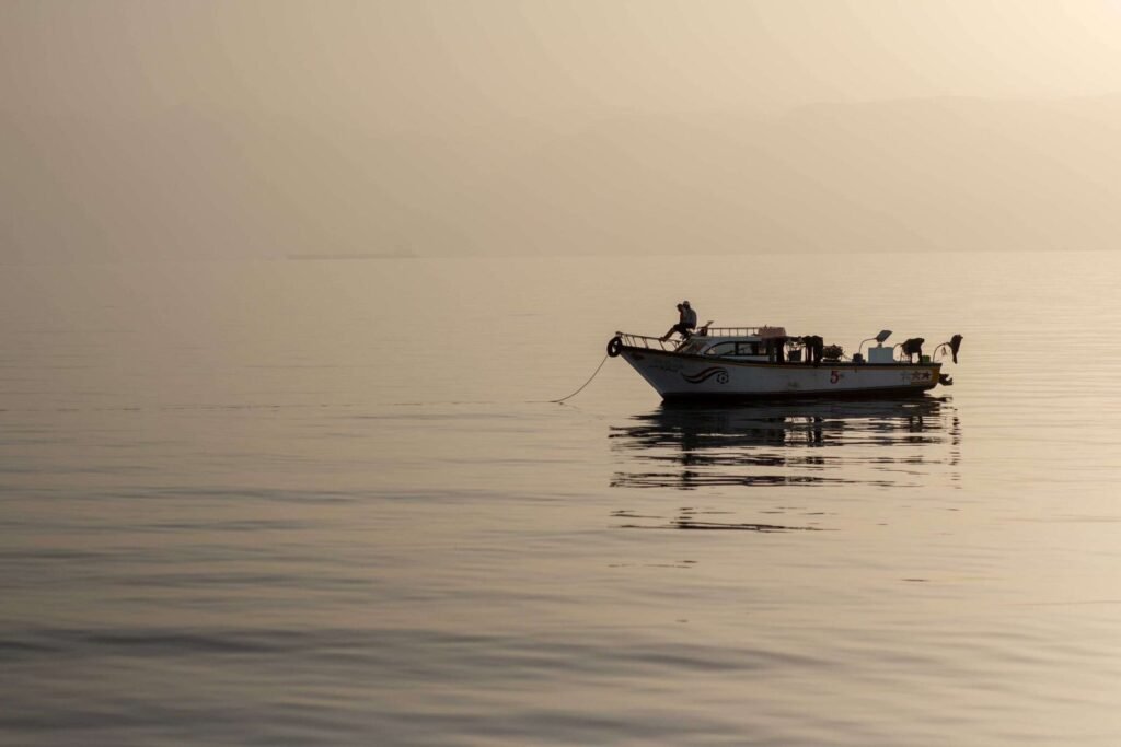 Solitary Fishing Boat at Sunrise – Egypt