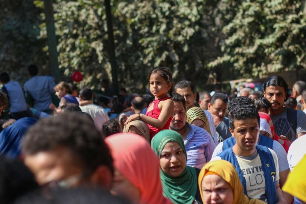 Mother Carrying Her Child at Giza Zoo During Eid al-Fitr 2017