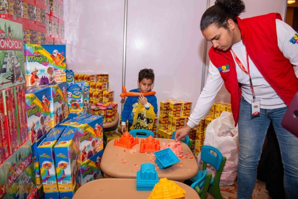 Child Playing with Sand Molds at a Learning Center – Cairo 2017 2