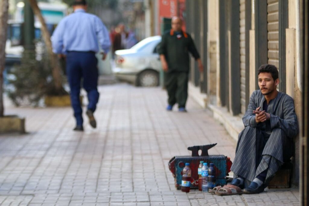 Shoeshiner Waiting for Customers on Magles El Wozara Street, Downtown Cairo 2