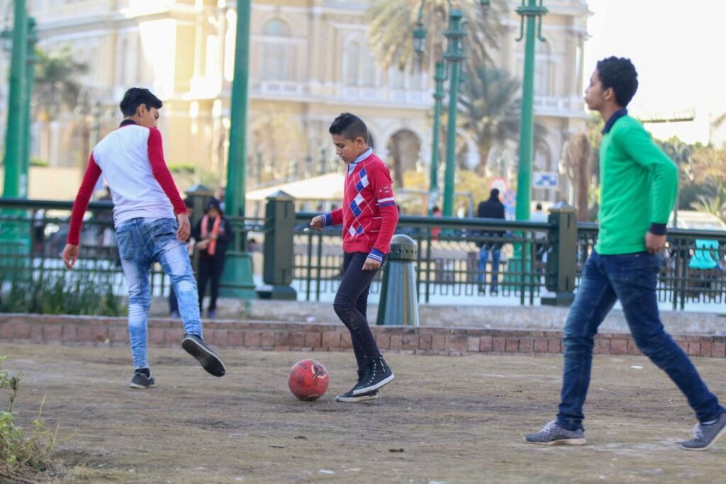 Boys Playing Football in Tahrir Square, Cairo