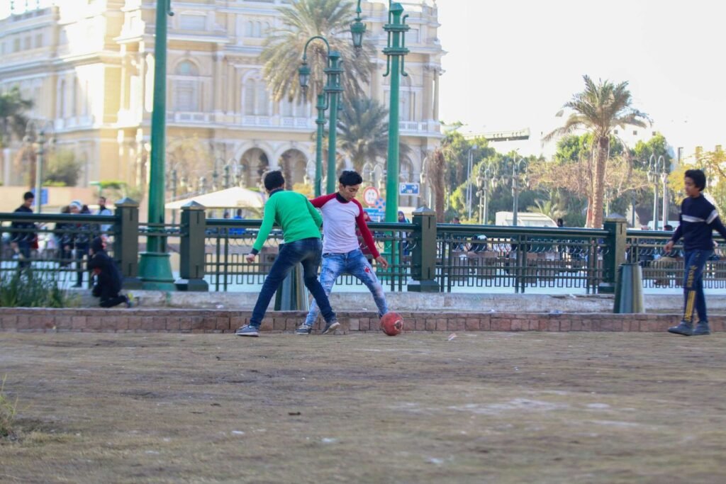 Boys Playing Football in Tahrir Square, Cairo