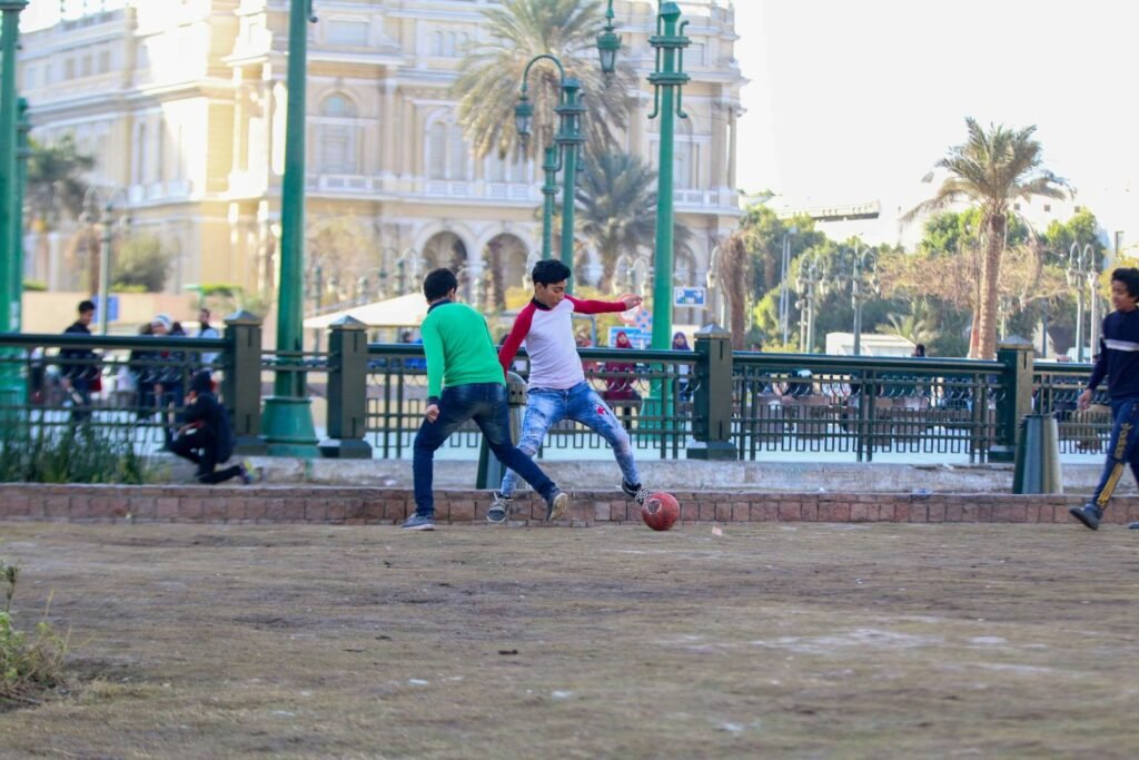 Boys Playing Football in Tahrir Square, Cairo