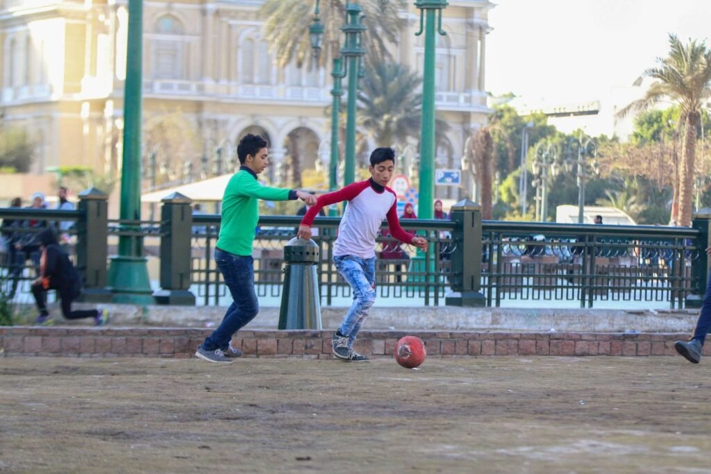 Boys Playing Football in Tahrir Square, Cairo