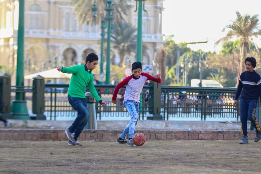 Boys Playing Football in Tahrir Square, Cairo