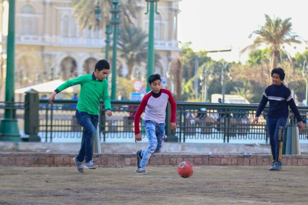 Boys Playing Football in Tahrir Square, Cairo