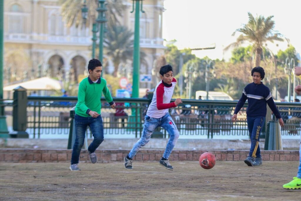 Boys Playing Football in Tahrir Square, Cairo