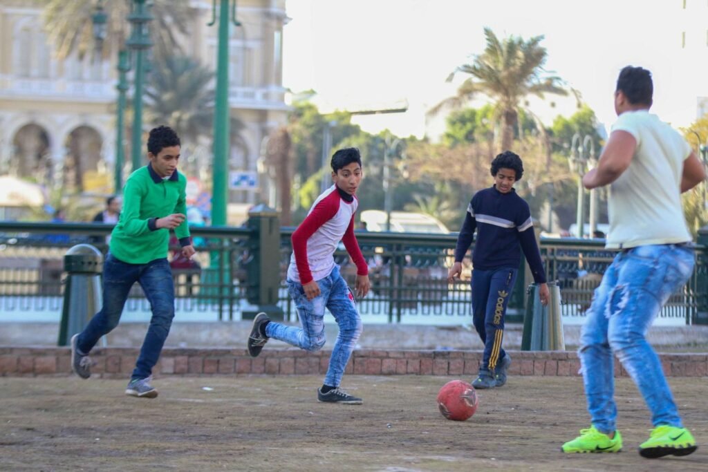 Boys Playing Football in Tahrir Square, Cairo