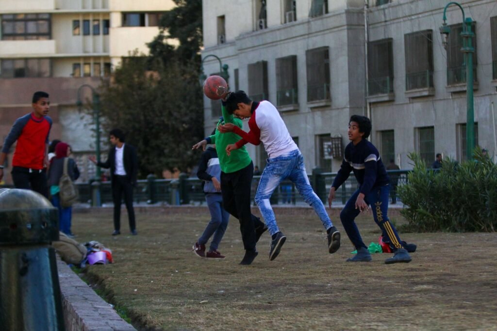 Boys Playing Football in Tahrir Square, Cairo