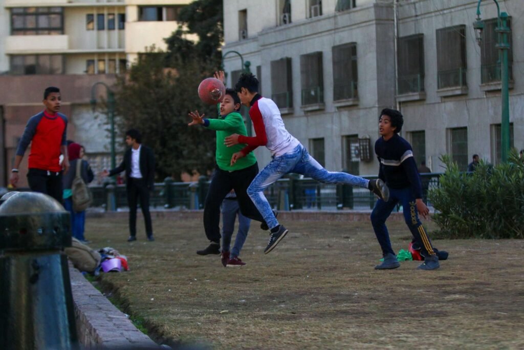 Boys Playing Football in Tahrir Square, Cairo
