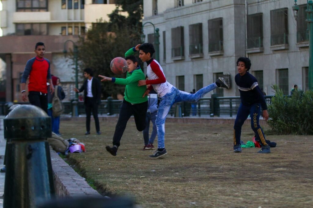 Boys Playing Football in Tahrir Square, Cairo