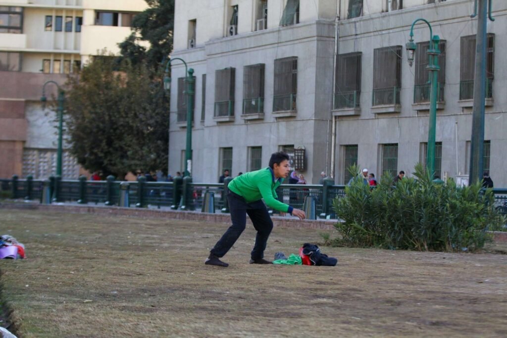 Boys Playing Football in Tahrir Square, Cairo