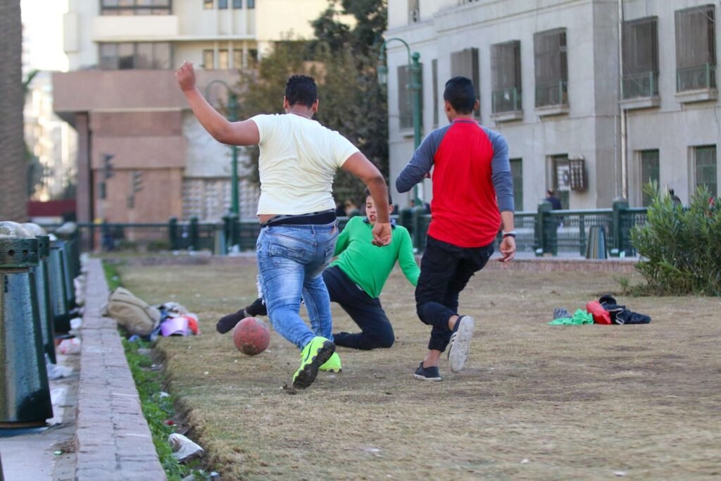 Boys Playing Football in Tahrir Square, Cairo