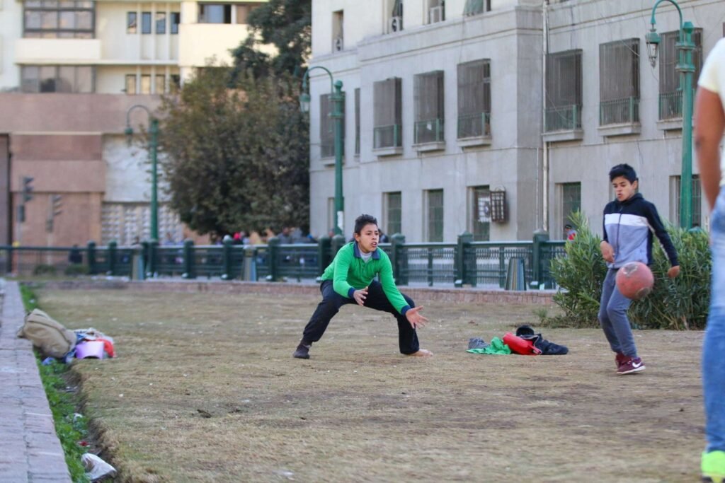 Boys Playing Football in Tahrir Square, Cairo