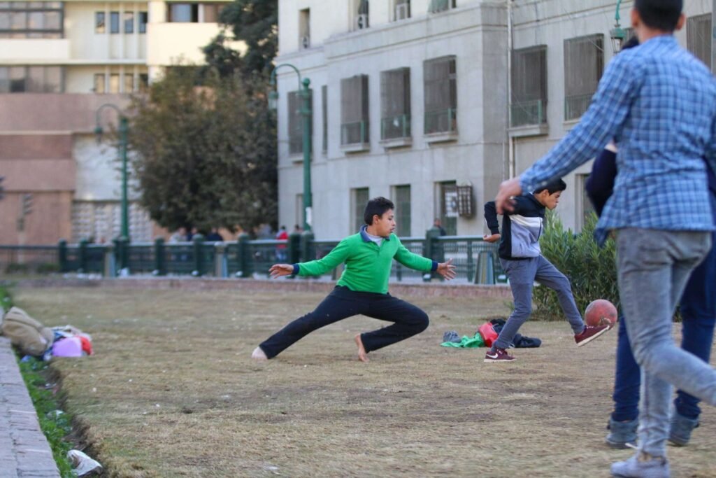 Boys Playing Football in Tahrir Square, Cairo