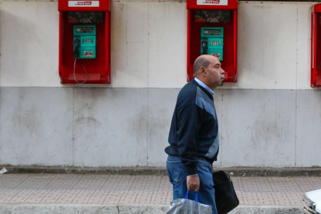 Man Walking on Mohamed Mahmoud Street in Front of the Telephone Exchange 2