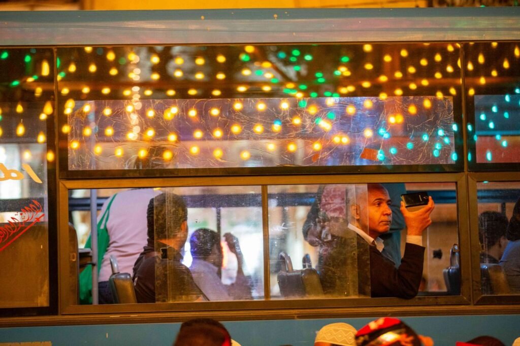 Man Looking Out of Public Bus – Cairo 2017