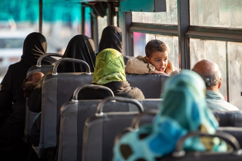 A child looking out of a bus window in Cairo, Winter 2017 2