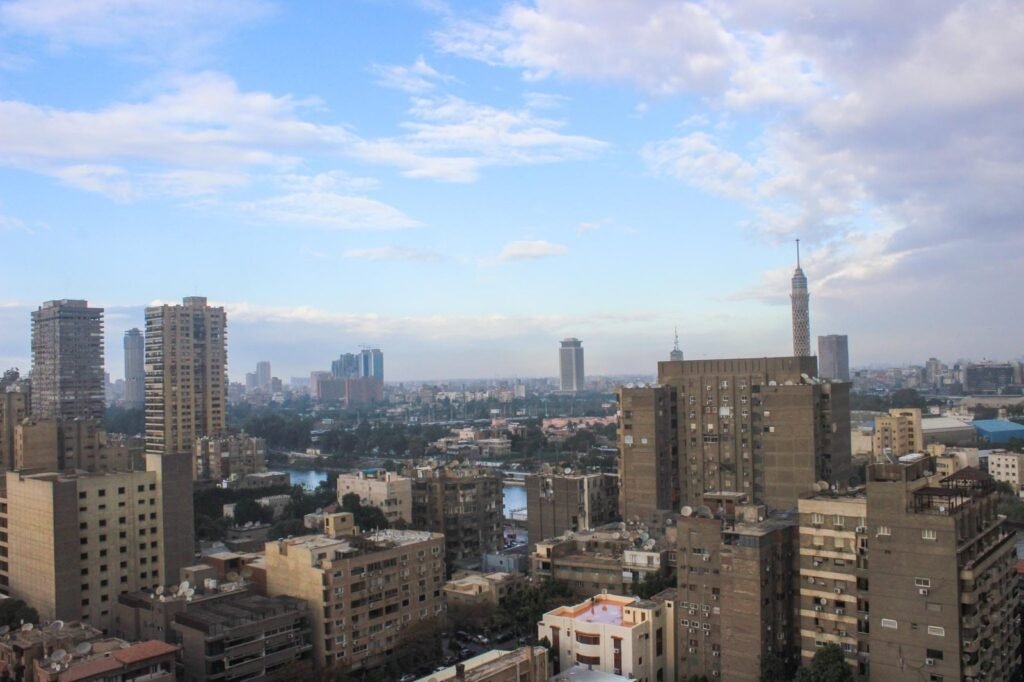 A view of Cairo from Dokki, featuring the iconic Cairo Tower in the distance.