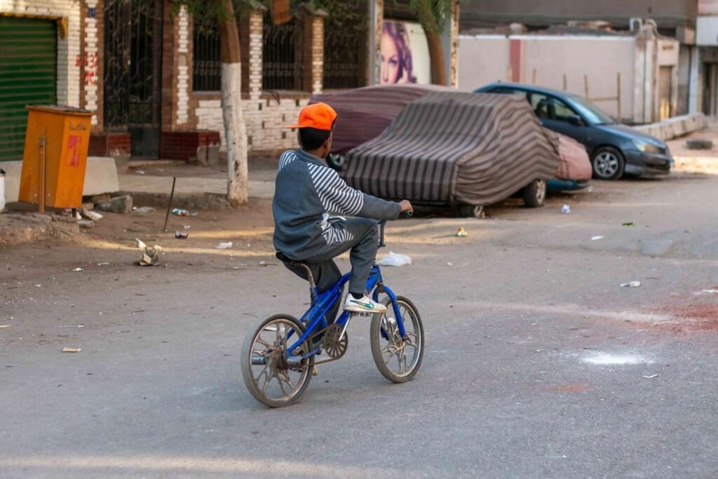 Boy on a Blue Bicycle – Sudan Street, Cairo 2017