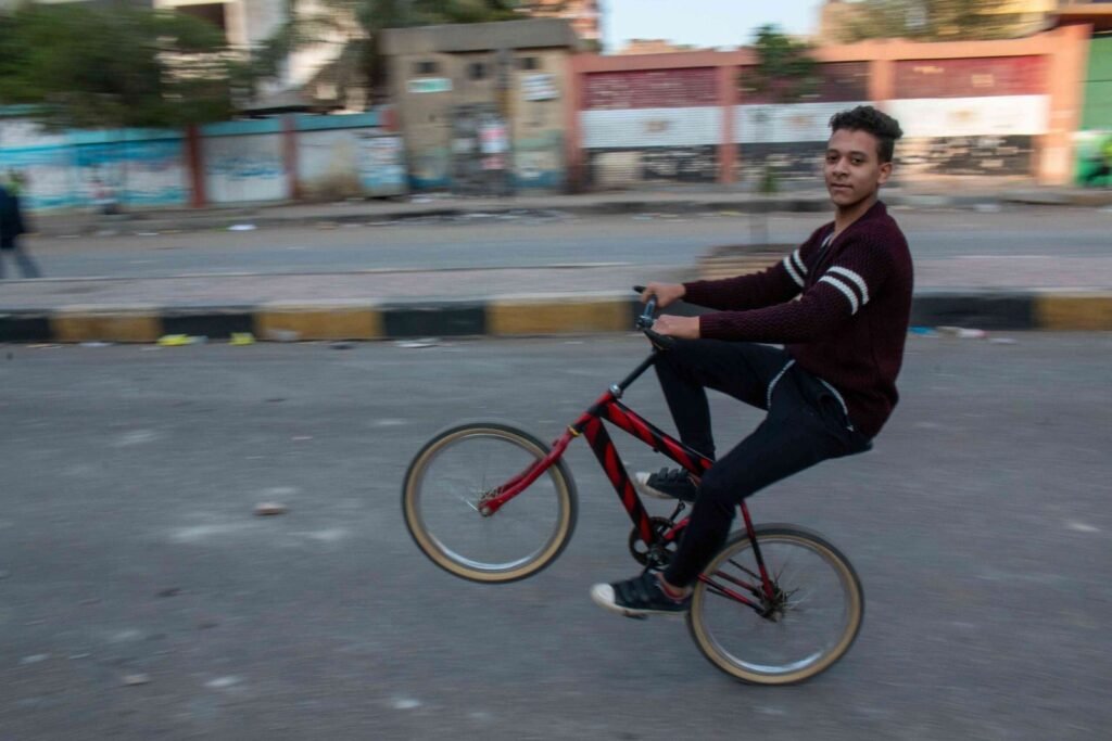 Boy on a Blue Bicycle – Sudan Street, Cairo 2017