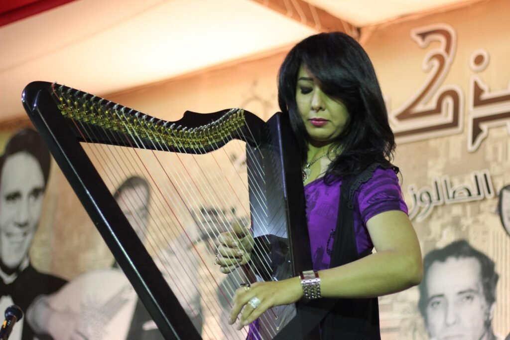 Portrait of a Girl Playing the Harp – Music and Grace in Harmony