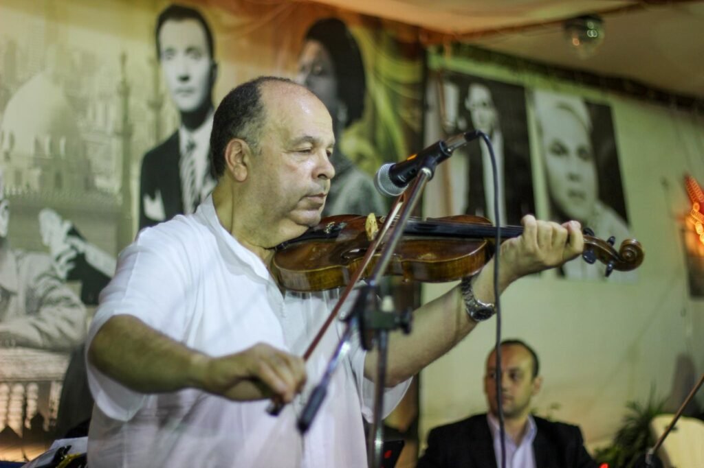 Oriental Violin Player – Expressive Musical Moment