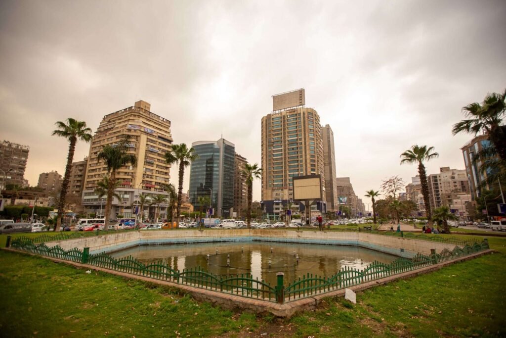 Urban Pond Surrounded by Tall Buildings in Cairo